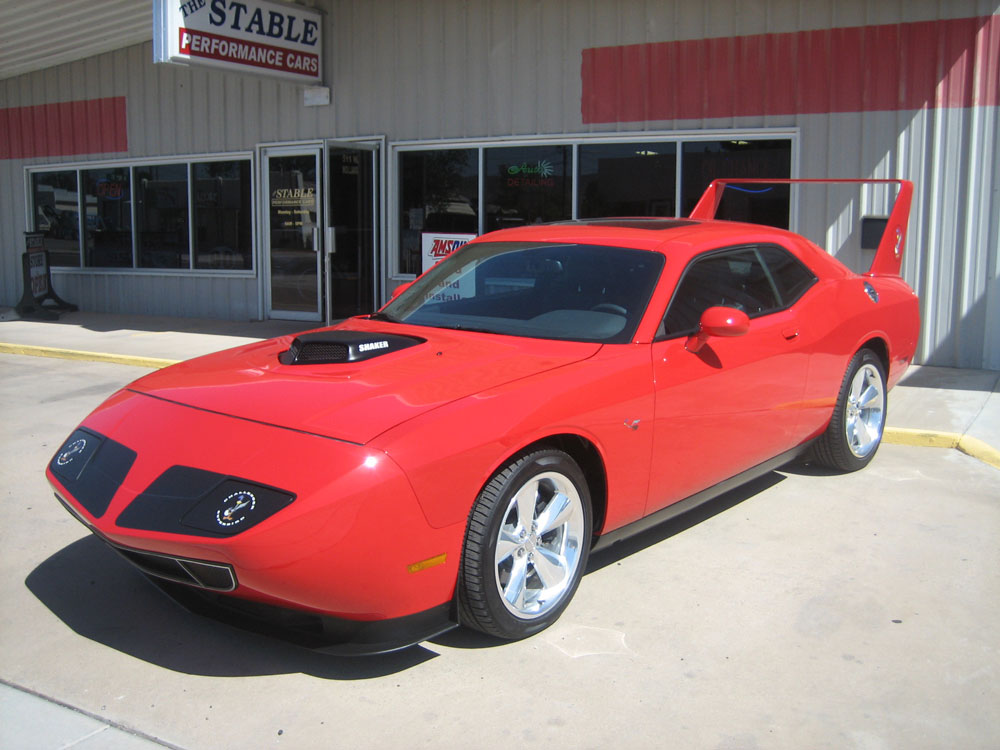 Red Dodge Daytona Roadrunner on display at The Stable Performance Cars in Alpine TX