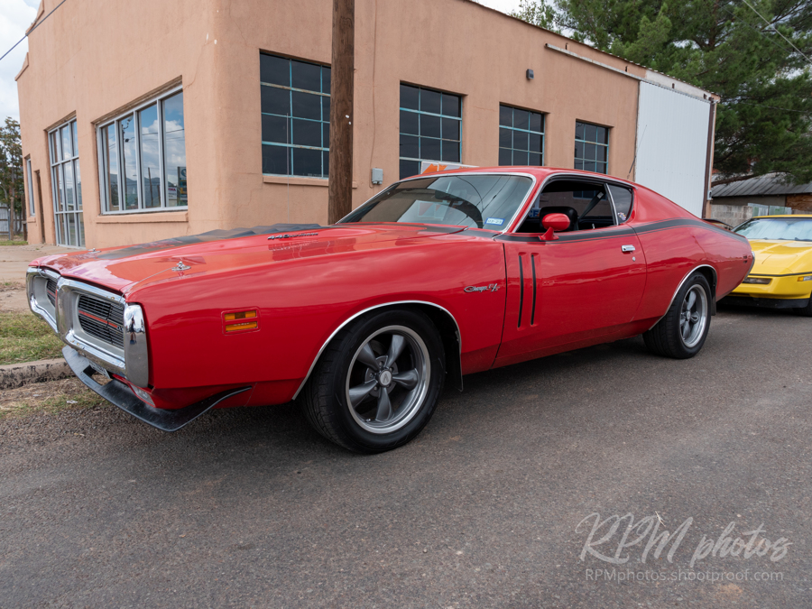 A '71 Dodge Charger RT parked at The Stable Performance Cars during Octane Fest.