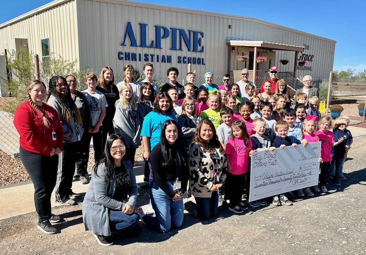 Students of Alpine Christian School received donation from The Stable Performance Cars.